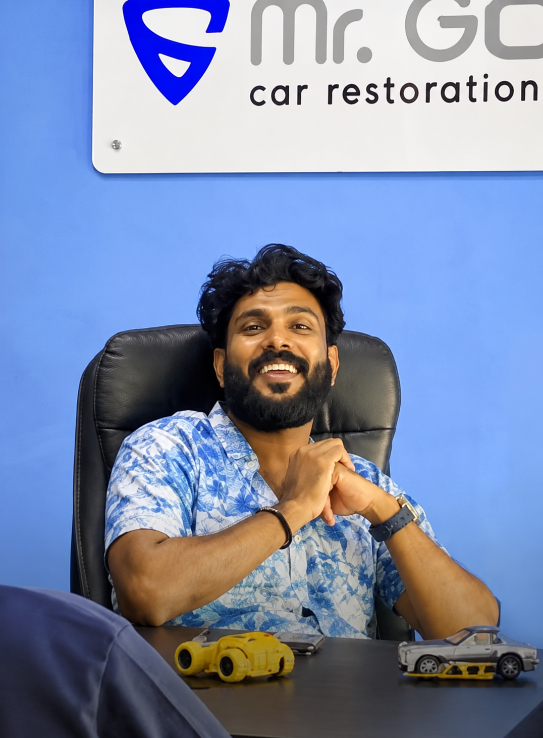 Arun, founder of Mr. Gubot, at the car restoration centre
